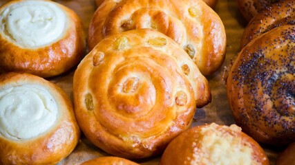 Golden baked pastries filled with cream and swirled dough