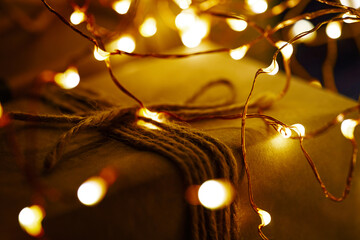 Christmas gift with twinkling lights and rustic charm