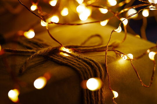 Christmas gift with twinkling lights and rustic charm