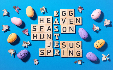 Crossword puzzle with wooden blocks and easter theme