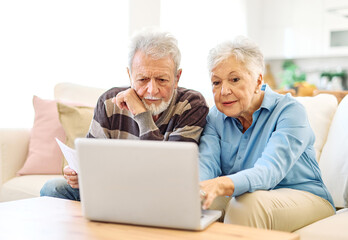 woman man senior bill finance retirement couple home document laptop wife computer budget elderly together mature old retired paperwork tax