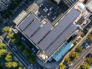 modern office building with solar panel on rooftop © zhu difeng