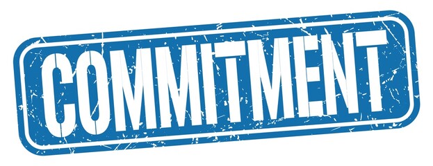 COMMITMENT text written on blue stamp sign.