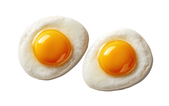 Two perfectly cooked fried eggs, whites set, yolks bright yellow