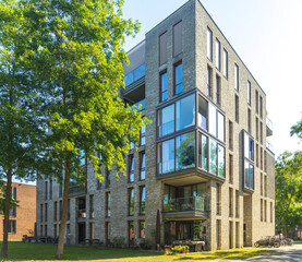 silhouette of boats cruising on golden IJ river against sunset during Sail Amsterdam 2025, tall ships romantic