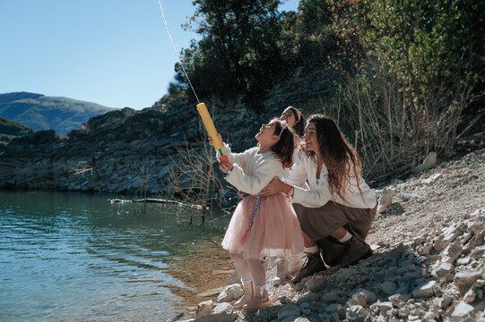 Family enjoying a joyful day by the Italian lakeside