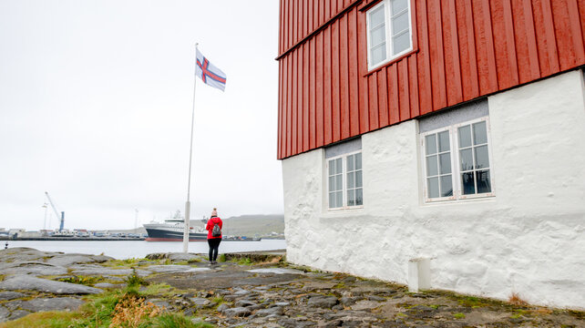 Flag of the Faroe Islands by the sea in Torshavn
