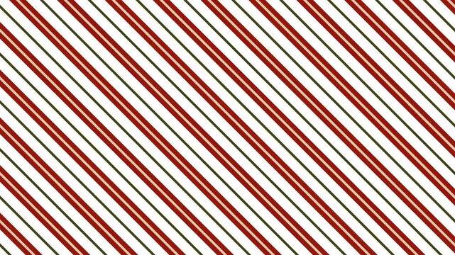 Seamless animated red, green and white diagonal striped background moving candy cane pattern festive Christmas style looped abstract holiday motion backdrop for winter design projects presentations