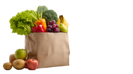 A paper grocery bag filled with fresh vegetables, lettuce, broccoli, bananas, grapes, red pepper, potatoes, and apples, placed with additional fruits and vegetables in front.