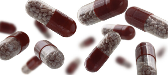 Capsules with the drug levitate on a white background