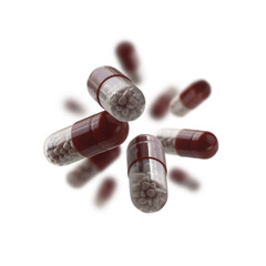 Capsules with the drug levitate on a white background