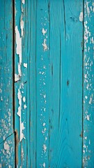 Old wooden surface with cracked and peeling turquoise paint. Rustic weathered wood texture perfect for background, design, or vintage projects.
