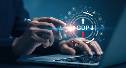 Hand using laptop with Gross Domestic Product GDP concept, illustrating financial analysis and successful investment in global stock market banking