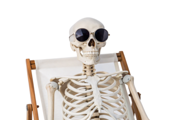 Skeleton wearing sunglasses relaxing on white beach chair in vacation pose, isolated on a transparent background