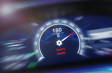 A car dashboard driving 180 kilometers per hour, selective focus