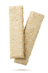 Sesame bars, kozinaki flying on a white background. Isolated