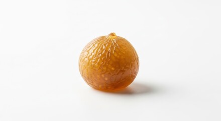 A single, small, round, amber-colored fruit with a slightly textured surface, isolated on a clean white background.