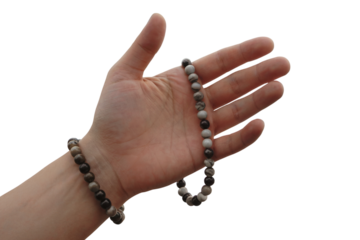 hand wearing beautiful beaded jewelry . Isolated on transparent background, png