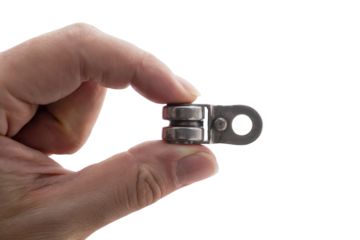 Human Hand Holding a Small Pulley Wheel . Isolated on transparent background, png