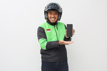Asian online taxi driver motorbike wearing green jacket showing blank screen of mobile phone