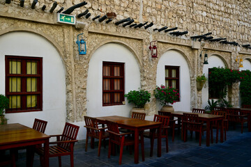 Souq Waqif is a souq in Doha, in the state of Qatar. The souq is known for selling traditional garments, spices, handicrafts, and souvenirs