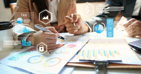 Business people organizing tax checklist through virtual interface. Tax planning services to maximize tax savings and optimize business finances