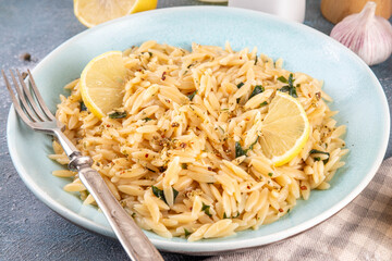 Lemon Orzo Pasta with aromatic herbs and garlic, italian tasty simple pasta recipe, comfort food for lunch or dinner
