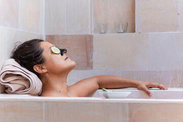 Relaxing spa experience with cucumber eye treatment