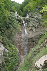 A small, beautiful mountain waterfall