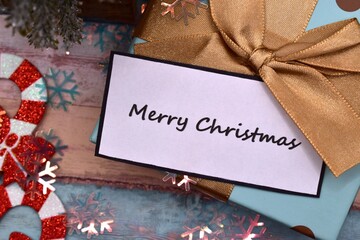 christmas present with merry christmas card 