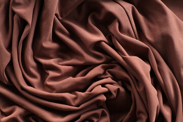 Close-Up of Draped Satin Material in Warm Earth Tone