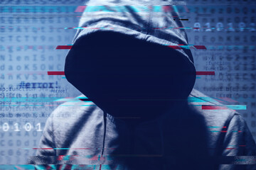 Faceless hooded hacker surrounded by digital computer code and binary digits, concept of cybercrime, data breach, and online security.