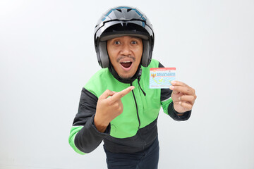 Happy Asian online taxi driver holding ID Card and Driver's license © ArvStd