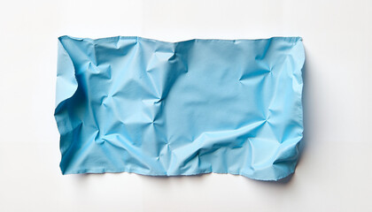 Crumpled light blue paper on white background, textured minimalism with soft contrast