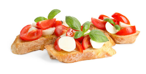 Tasty bruschettas with mozzarella cheese, tomatoes and basil isolated on white