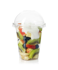Tasty fruit salad with yogurt in plastic cup isolated on white