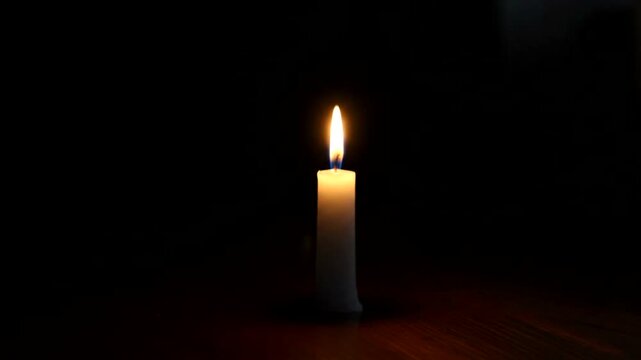 Illuminating Serenity: A Captivating Visual Journey of Candle Lighting in Darkness