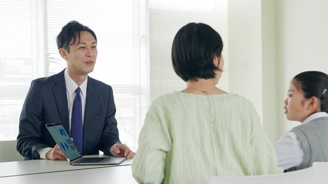 Parent and child having a three-way consultation