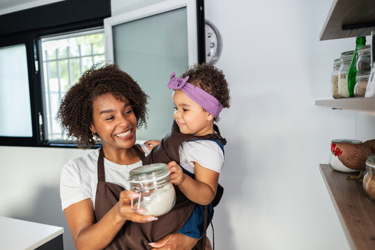 Mother and daughter enjoying time in the kitchen