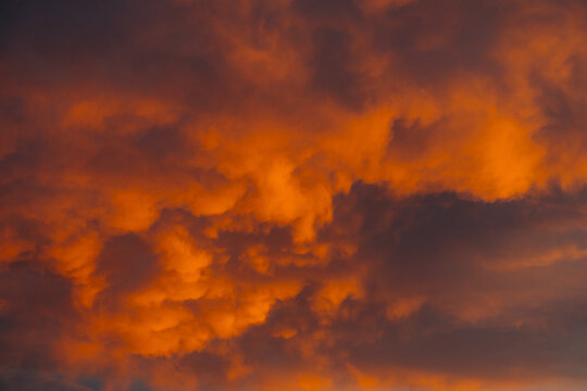 Dramatic evening sky with vibrant orange clouds