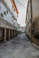 Fototapeta premium Narrow Historic Alleyway in Old European Town