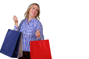 Woman enjoying shopping experience, feeling happy and looking excited with full retail paper bags, transparent background