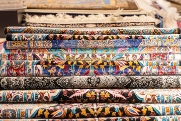 New Turkish carpets folded and sold at the Turkish bazaar.