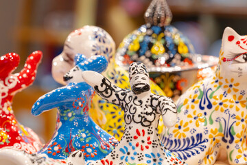 Ceramic figurines in the form of dancing men, a national Turkish dance.