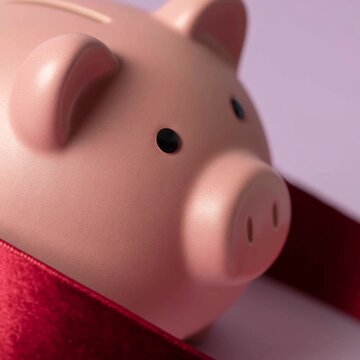Blush pink round piggy bank, lavender studio, burgundy velvet ribbon. Pastel Christmas blush pink with Cherry Lacquer burgundy accents.