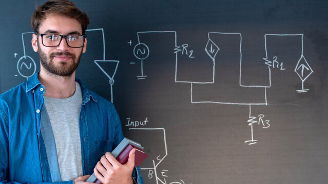 university student  writing on blackboard