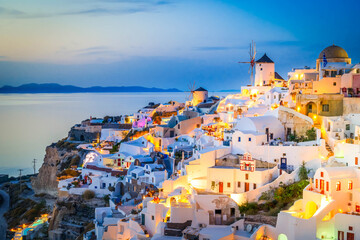 Fototapeta premium beautiful details of Santorini island, night lights of Oia village at blue night, Santorini Greece
