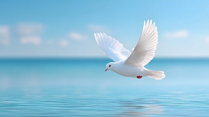 Fototapeta premium Symbol of peace and freedom a pristine white dove with wings spread wide flies low over the gentle waves of a serene turquoise sea and bright blue sky