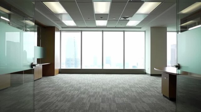 Empty office interior with large windows, city skyline, natural light, and space for use
