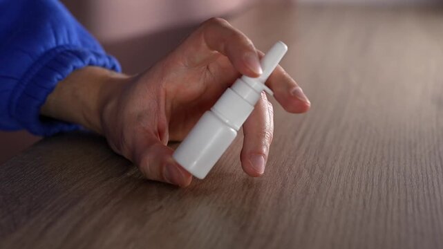A bottle of nasal congestion medication.
Nasal spray for colds and flu.
